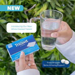 Tricovit tablets in hand demonstrating easy daily dosage.
