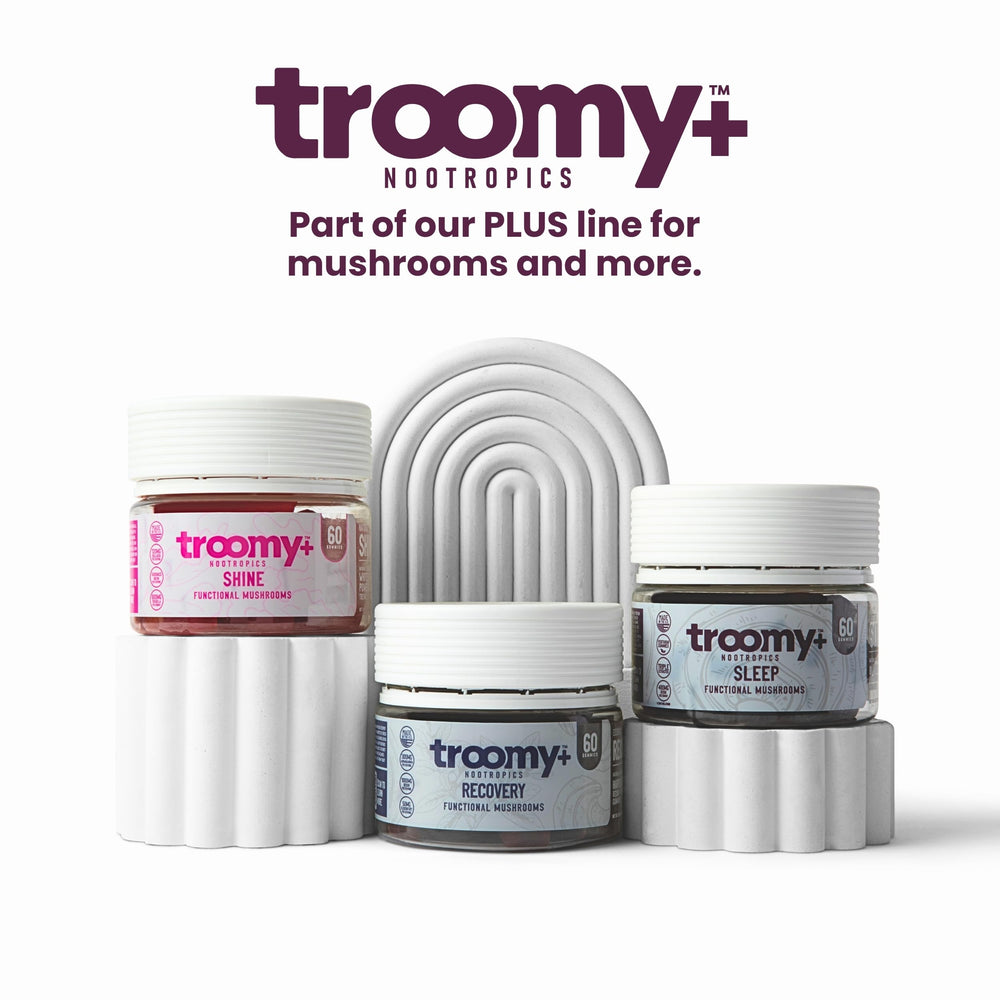 Bottle being poured from Troomy Sleep Gummies for easy nightly access