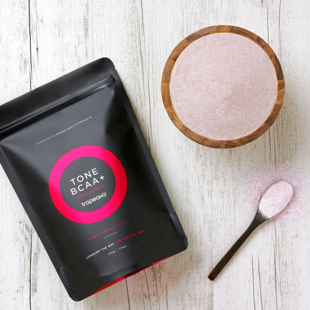 Tropeaka Tone BCAA+ scoop for precise pre-workout measurements.