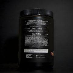 Troponin WTF Pre-Workout scoop dissolving in water for quick mix and pumps.