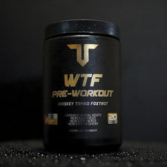 Troponin WTF Pre-Workout Strawberry Lemonade bottle on gym bench showing flavor.
