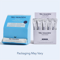 TRU NIAGEN stick pack in hand for on-the-go hydration.