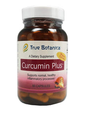 True Botanica Curcumin Plus capsules sit on a white surface for daily wellness.