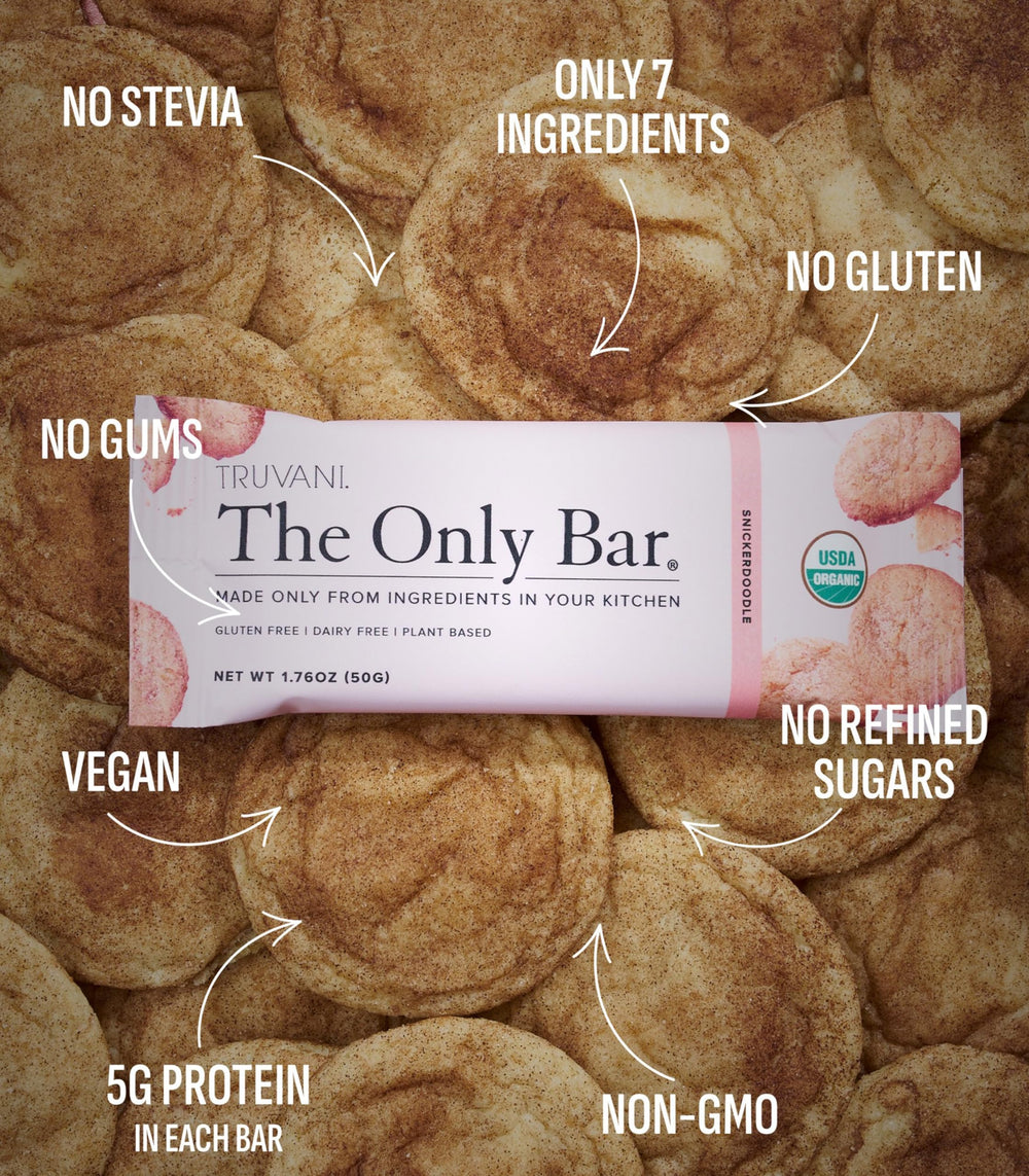 Truvani Snickerdoodle bar ingredients close-up showing almonds and dates.