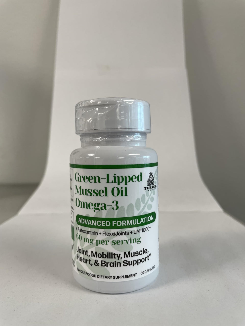 TURNER GLMO bottle on kitchen counter suggesting everyday wellness routine