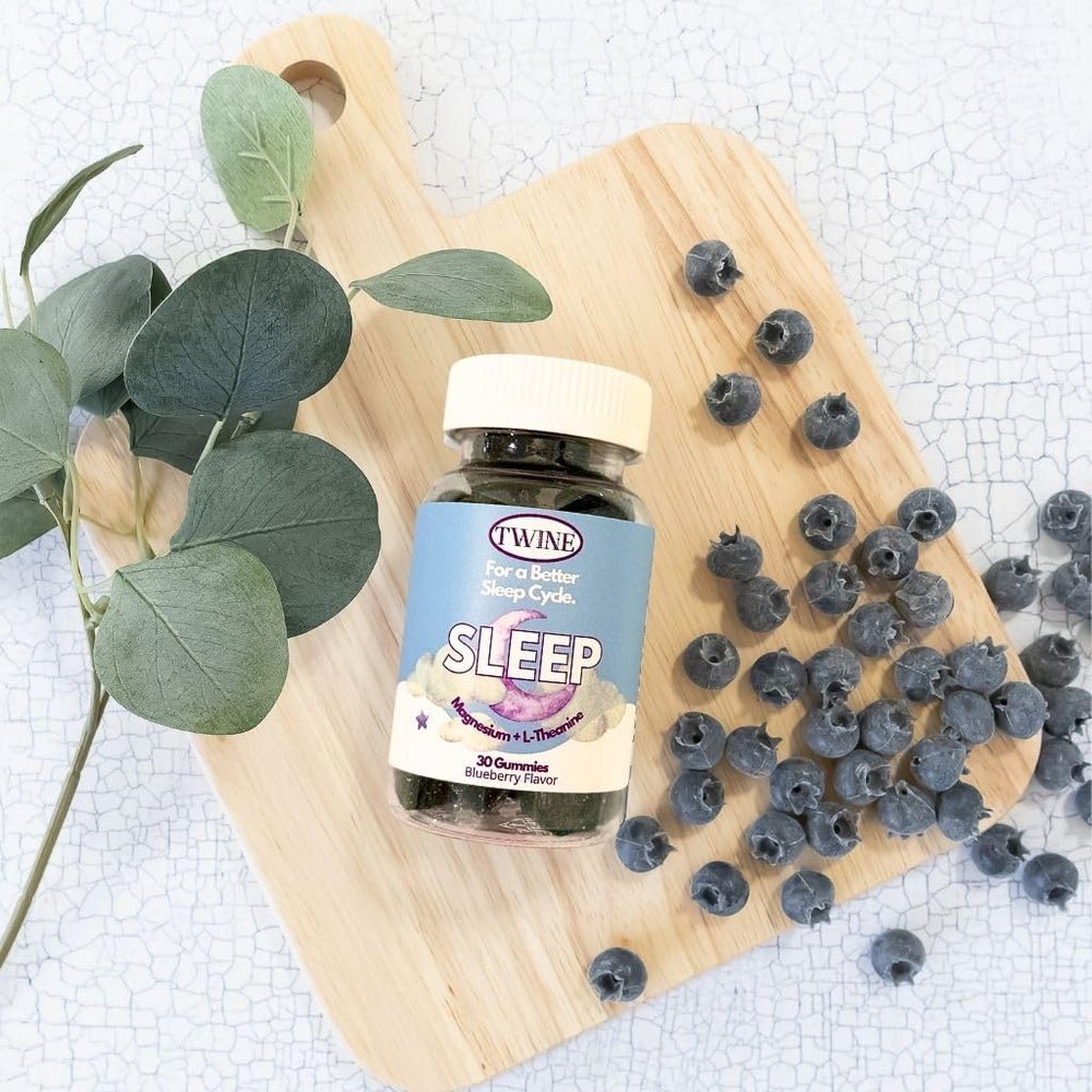 TWINE Sleep Gummies bottle on a nightstand creating a soothing evening ritual.