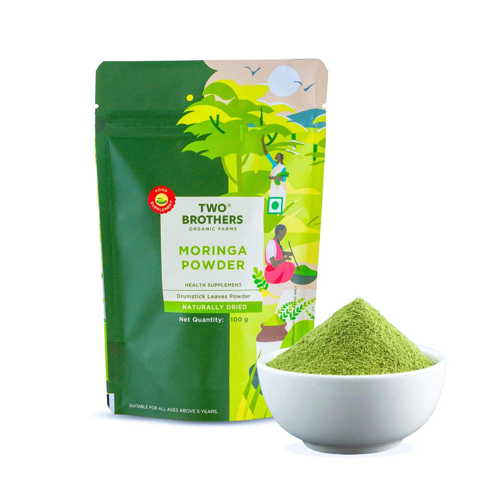 Two Brothers India Farms Moringa powder jar shows a nutrient-dense supplement for smoothies