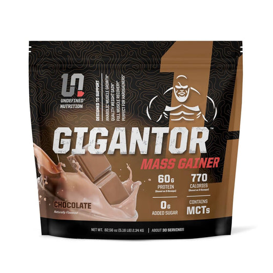 Undefined Nutrition Gigantor Mass Gainer bottle ready for a high-calorie shake.