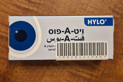 Nighttime application scene with UPAX VitA-POS Ointment near the eye area.