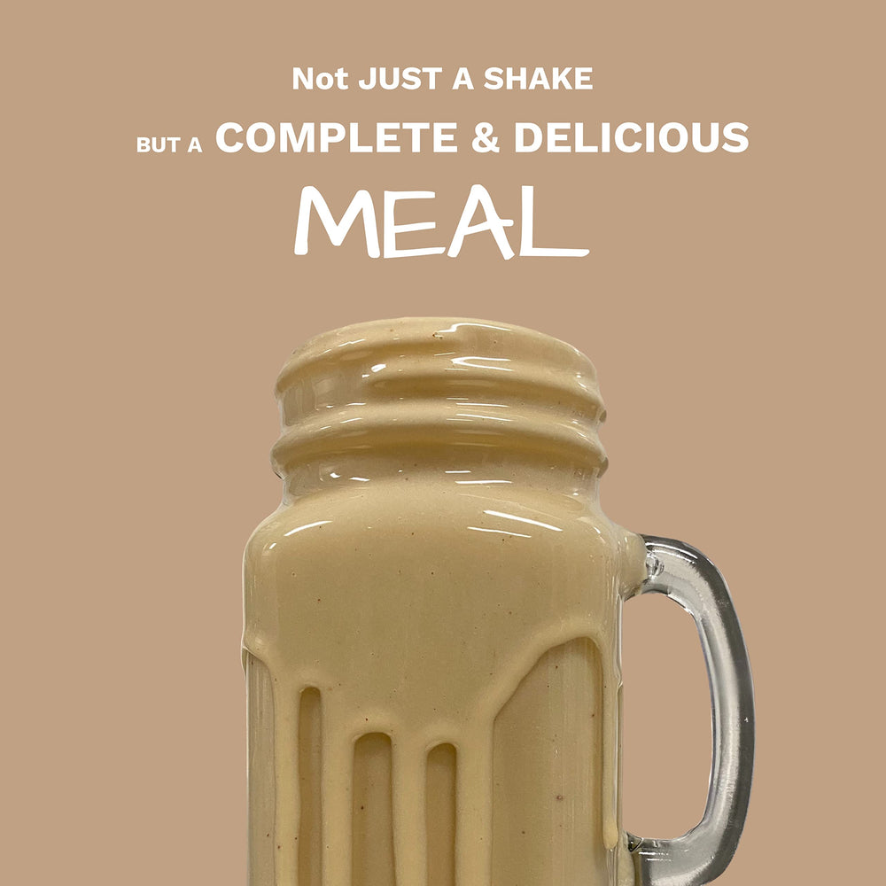 Batido UpNourish vainilla galleta en vaso, merienda nutritiva rápida.