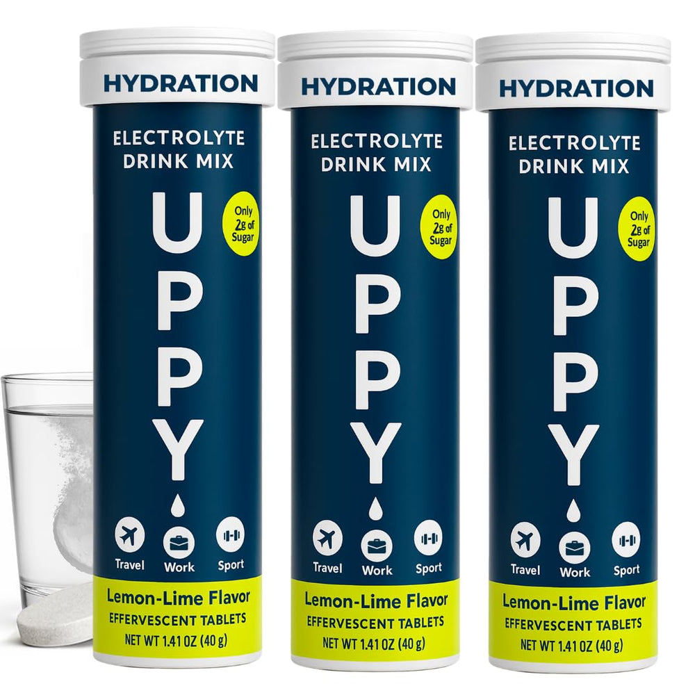 Uppy Lemon-Lime tablet dissolving in water for quick hydration