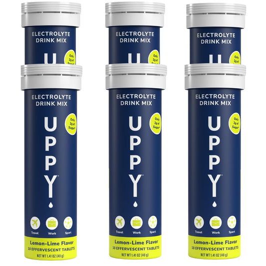 Uppy! lemon-lime tablets dissolving in water for rapid hydration on the go.
