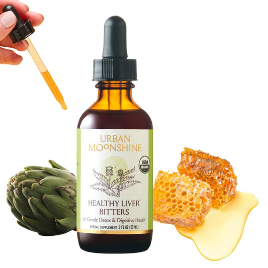 Urban Moonshine Healthy Liver Bitters bottle on countertop aiding gentle detox