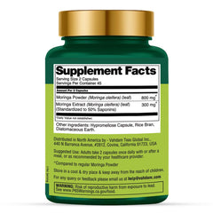 VAHDAM Moringa capsules on glass with cup, suggesting easy daily intake.