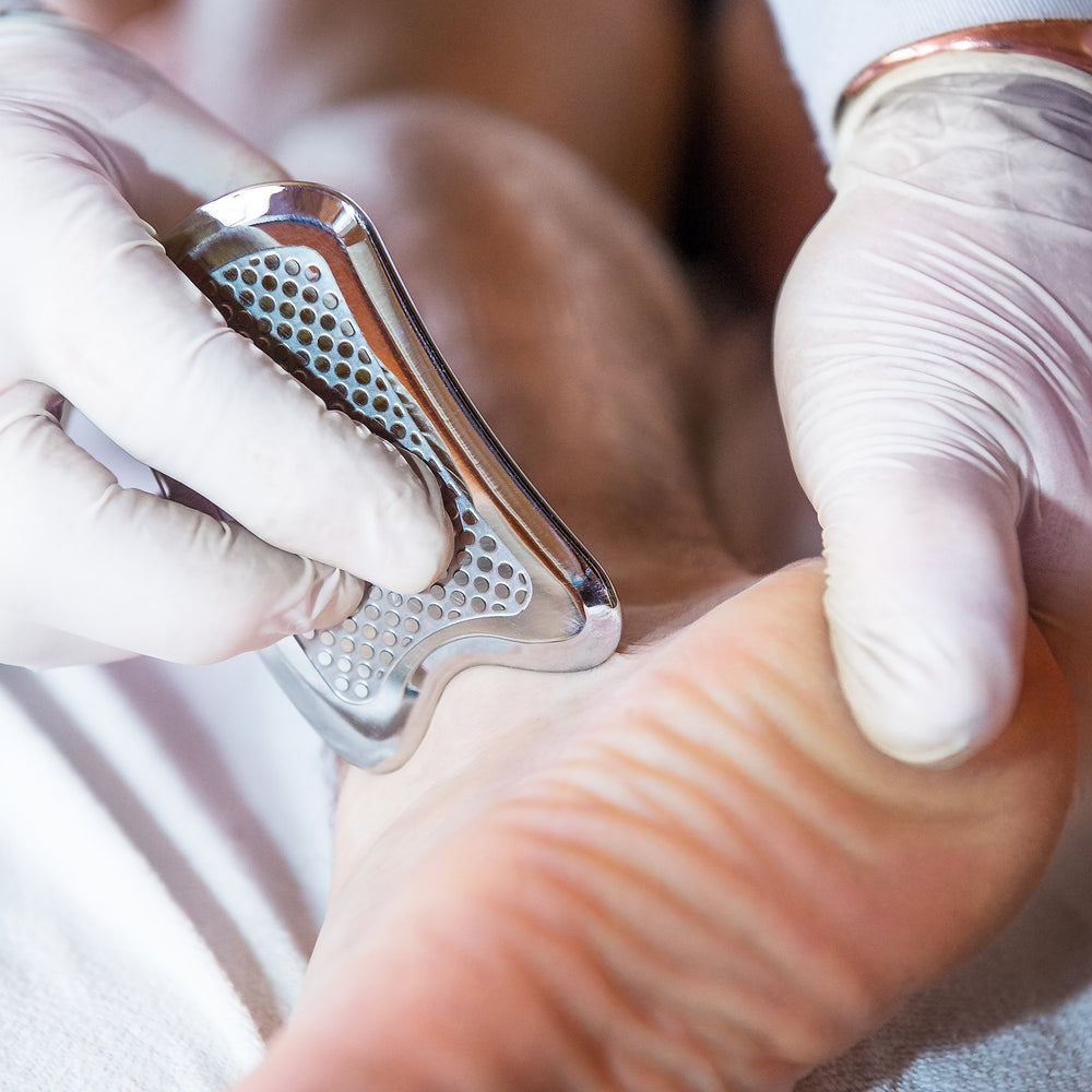 ValeoFM anti slip IASTM tool seen in therapy session