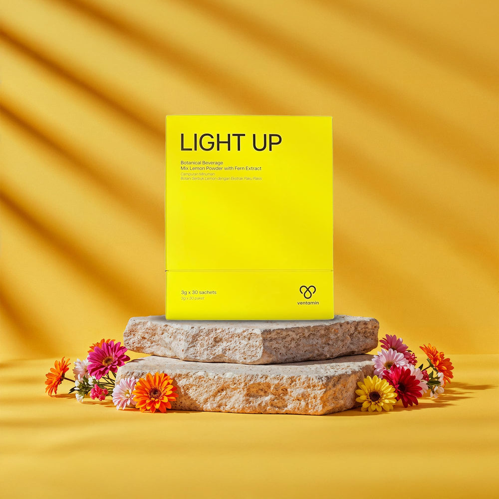 Ventamin Light Up sachet held in hand, ready to mix.