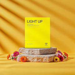 Ventamin Light Up sachet held in hand, ready to mix.