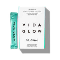 Vida Glow Marine Collagen bottle with scoop for easy daily use to support glow