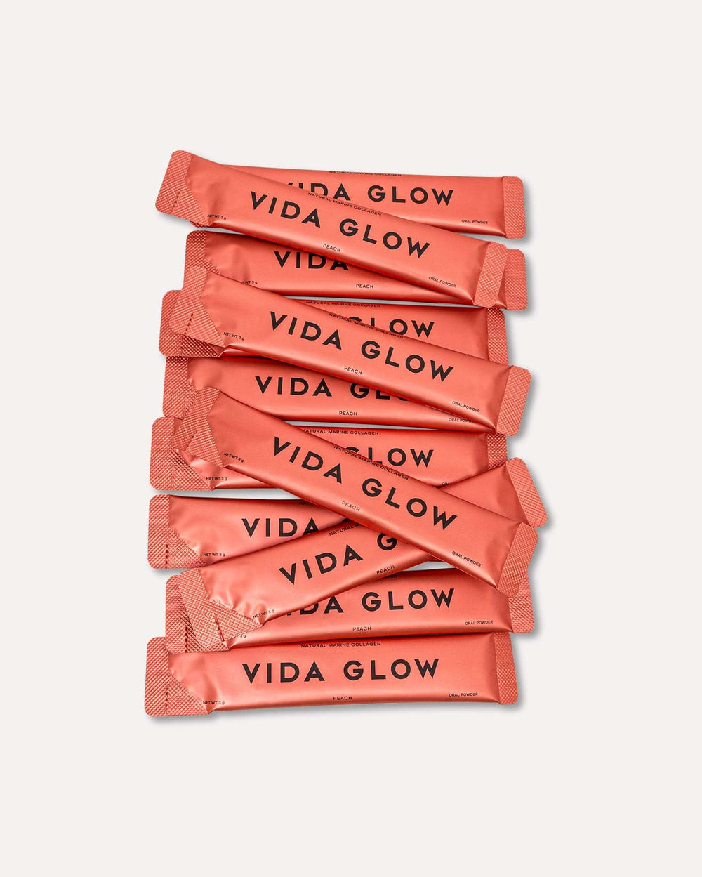 Vida Glow Marine Collagen Powder peach glass emphasizes flavorful, convenient drink boost.