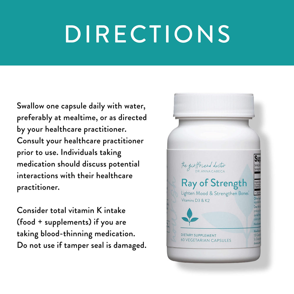 VIDAPURA Ray of Strength D3K2 bottle on shelf with water.