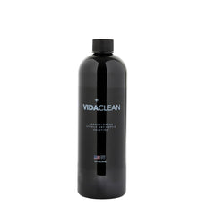 VidaSolutions VidaClean bottle pour demonstrates gentle antiseptic action for skin care.