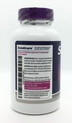 Measuring spoon with two Sciaticare capsules ready to take with a meal for daily ritual