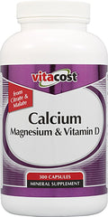 Vitacost Calcium Magnesium Vitamin D bottle label highlights minerals for bone support.