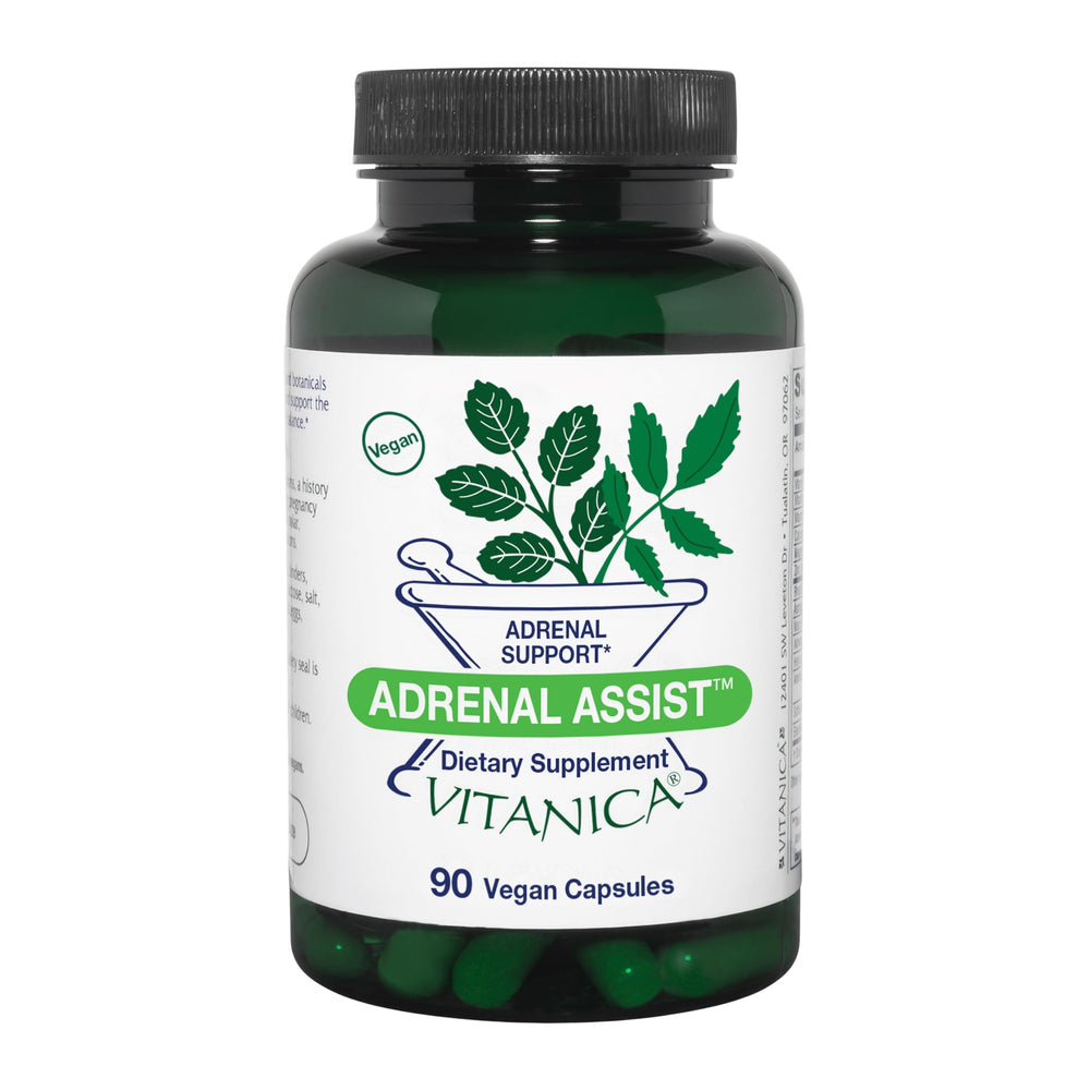 Vitanica Adrenal Assist bottle with capsules on a desk for daily adrenal support