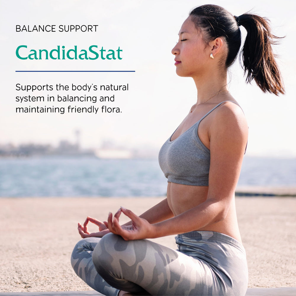 Vitanica Candidastat capsules closeup emphasizes caprylic acid and garlic extract.