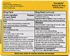 Vivarin tablet being taken as a caffeine dose for focus