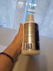 SILVER WATER COMPANY Wayne Rowland bottle pouring into glass for daily use