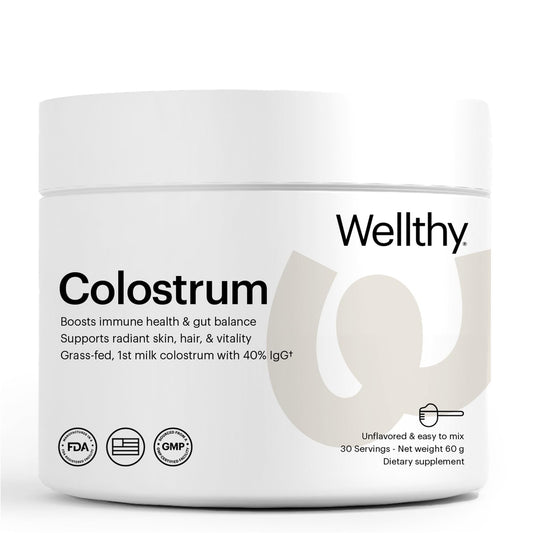 Wellthy Colostrum Powder front view shows a premium grass-fed formula for daily support.