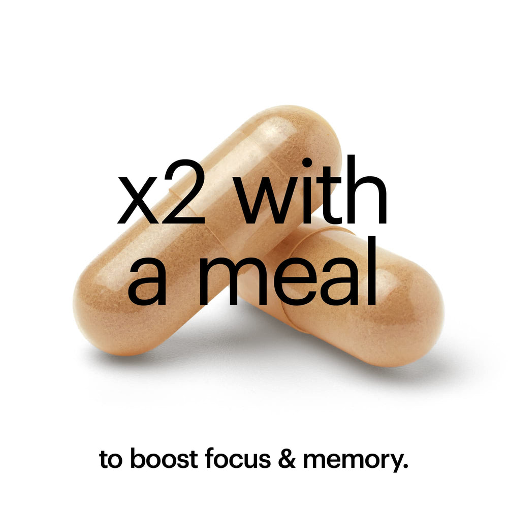 Wellthy Focus glass with pills ready for daily memory and motivation support