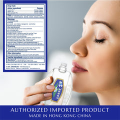 White Flower Balm Oil cap closeup highlights secure seal for travel.