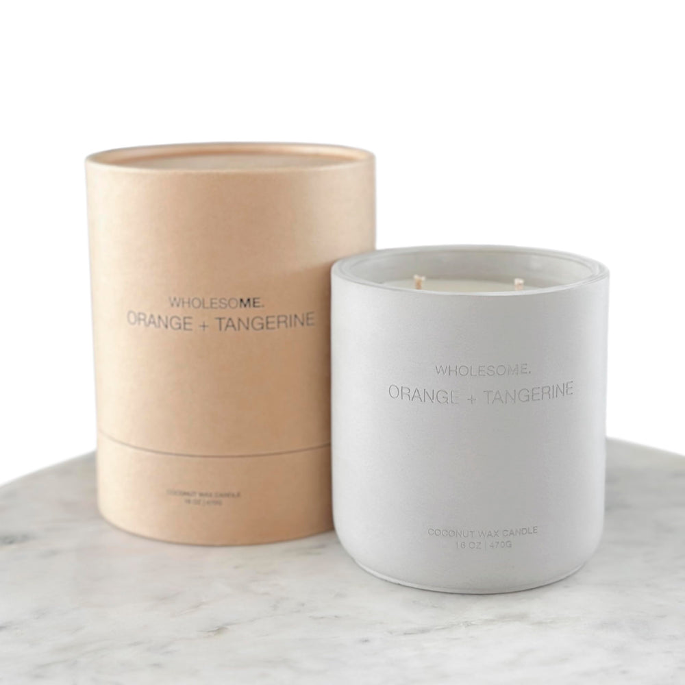 WHOLESOME Orange Tangerine candle in concrete jar closeup highlighting clean burn and scent
