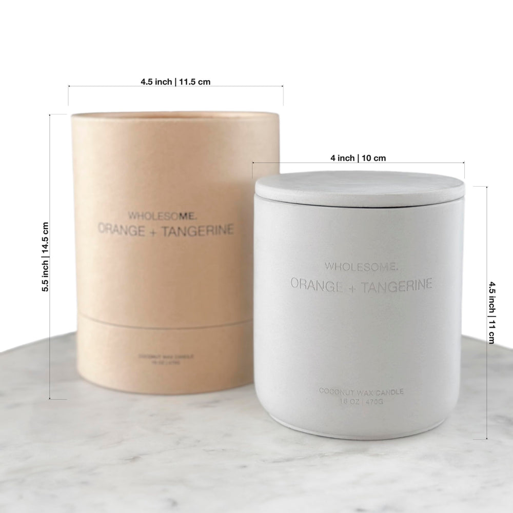 Overview of WHOLESOME orange-tangerine candle in concrete jar