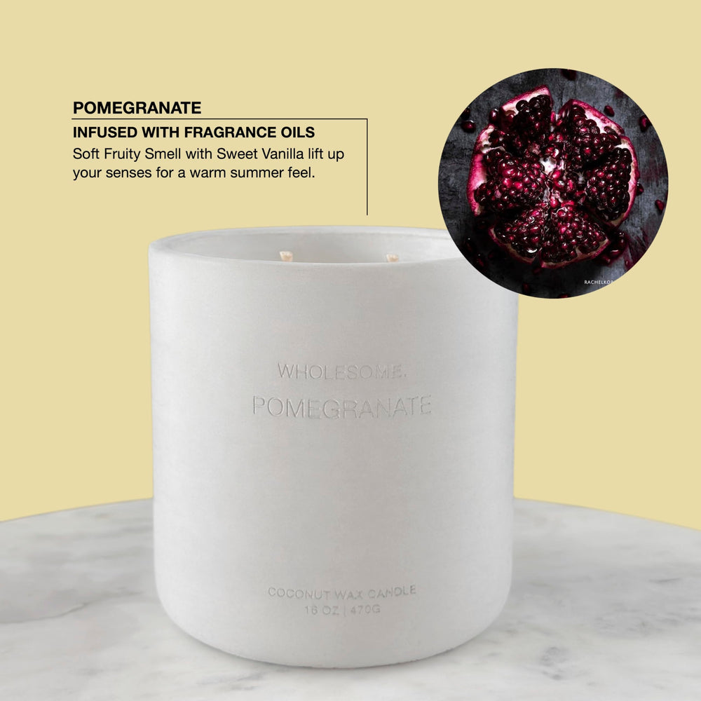WHOLESOME Pomegranate candle with two wicks burning for stronger, richer aroma.
