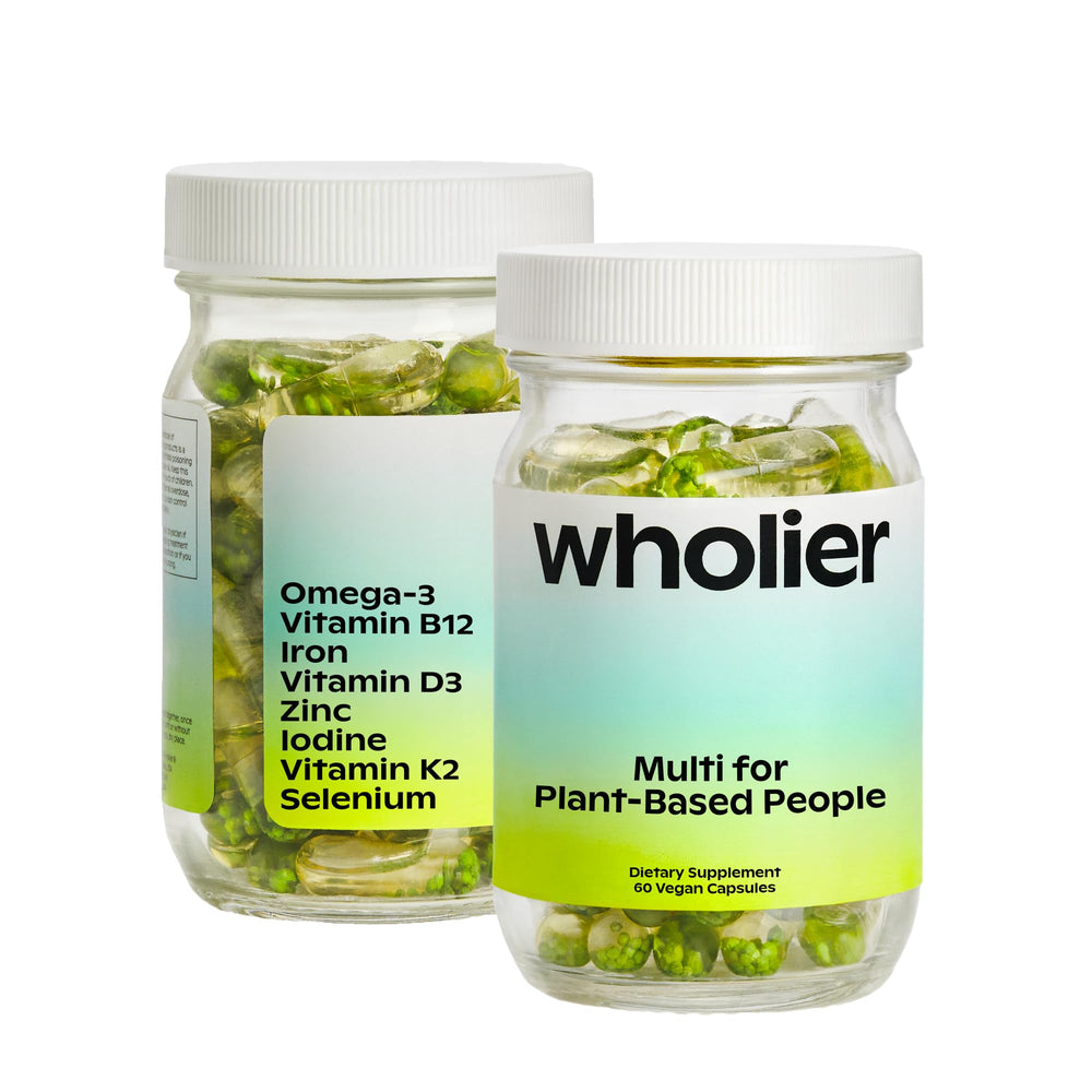 Wholier bottle front with citrus scent showing refreshing daily dose.