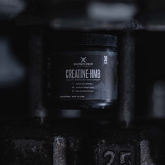 Wilderness Athlete Creatine HMB powder closeup highlights fine micronized texture.