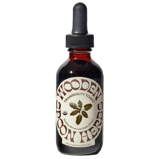 Wooden Spoon Herbs Tranquility Tonic bottle for stress relief.