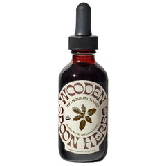 Wooden Spoon Herbs Tranquility Tonic bottle for stress relief.