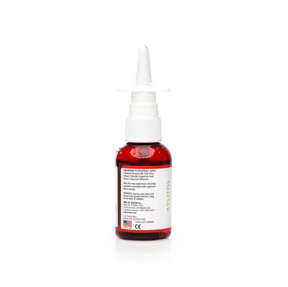 Close-up of Xlear MAX cap highlighting safety and easy use.