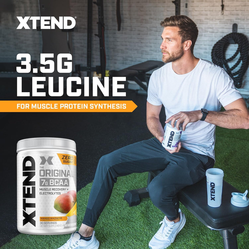 Xtend Original BCAA powder dissolving in water with electrolytes visible.