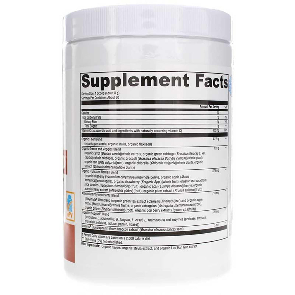 XYMOGEN OrganiX greens powder swirling in a glass for fiber and probiotics