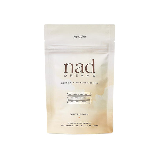 Xyngular NAD Dreams bottle front, a peachy sleep elixir for nightly rest.