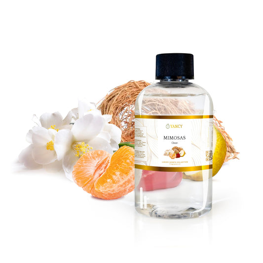 YANCY Mimosas diffuser bottle with bubbly citrus aroma to uplift spaces.