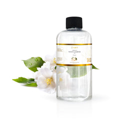 YANCY White Jasmine fragrance oil bottle in diffuser for a calming aroma.