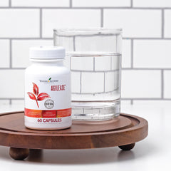 Young Living AgilEase box beside water illustrating simple intake