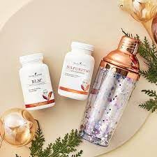Pouring Young Living BLM capsules from the bottle for a simple routine.