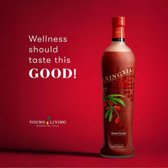 Young Living NingXia Red bottle on kitchen counter ready to mix into drinks.